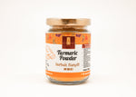 Jar of turmeric powder with a label on a white background